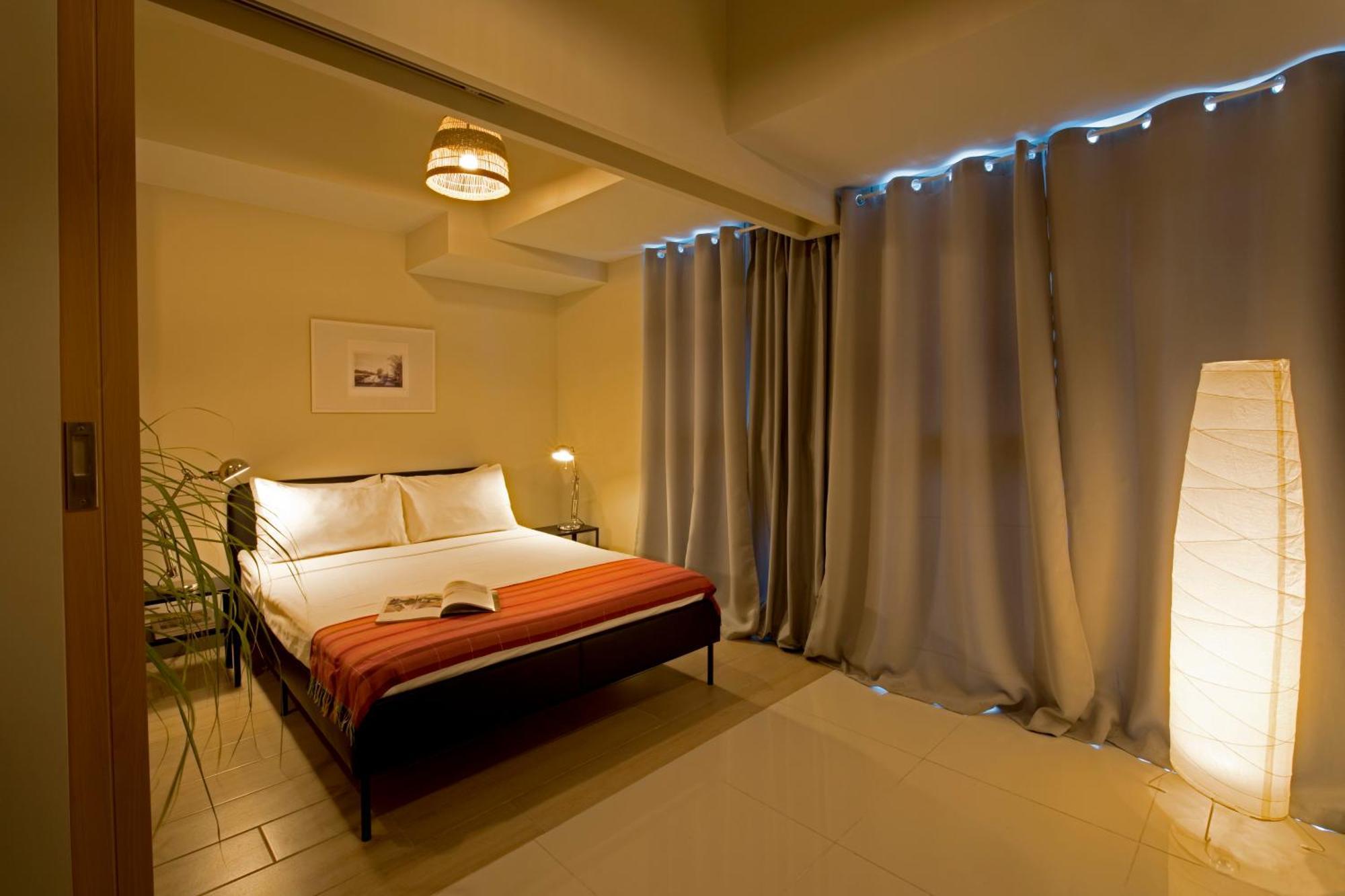 Uptown Parksuites Apartments Tower 2 Bgc By Ph Staycation 马尼拉 外观 照片
