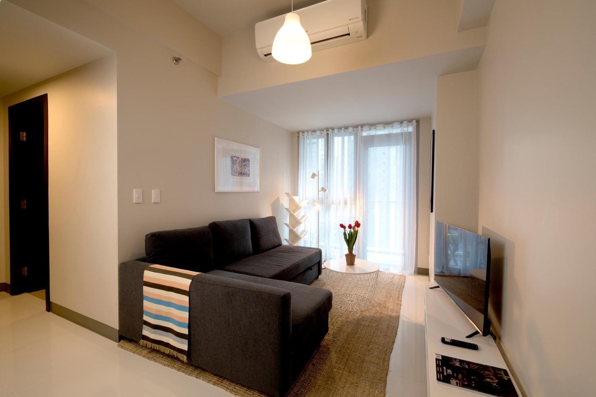 Uptown Parksuites Apartments Tower 2 Bgc By Ph Staycation 马尼拉 外观 照片